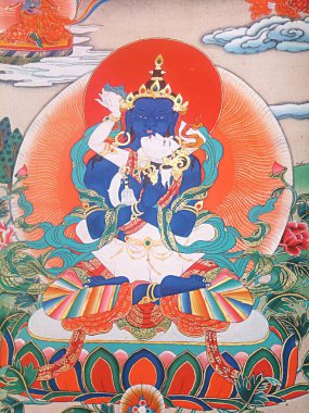 Tibetçe Vajradhara, Dorje Chang 'dir. O ilkel dharmakaya Buddha 'dır ve mavi renkte tasvir edilir, bütçenizin özünü ifade eder. Vajradhara tarihi Buda 'nın aydınlanmasının özünü temsil ediyor..