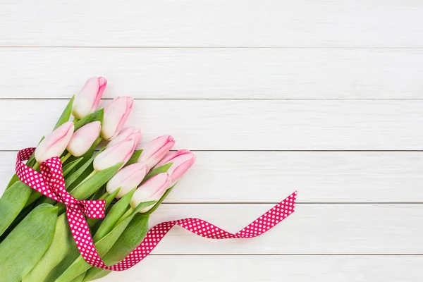 Bouquet Pink Tulips Decorated Ribbon White Wooden Background Top View — Stock Photo, Image