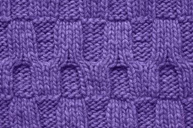 Ultra violet örme doku bir kabartma desenli renkli. El yapımı Triko. Arka plan, soyut. Yıl 2019 kavramı rengini