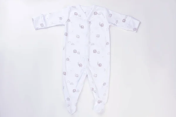 Footed baby toddler pajamas for children. White isolated backgroud.