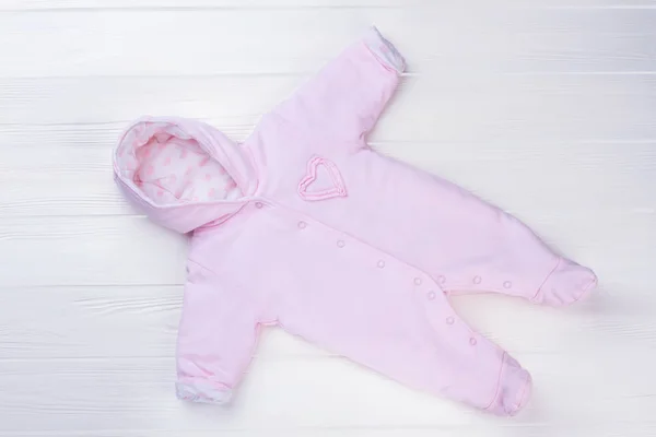 Hooded Pink Baby Fleece Jumpsuit Top View White Wood Background — Stock Photo, Image