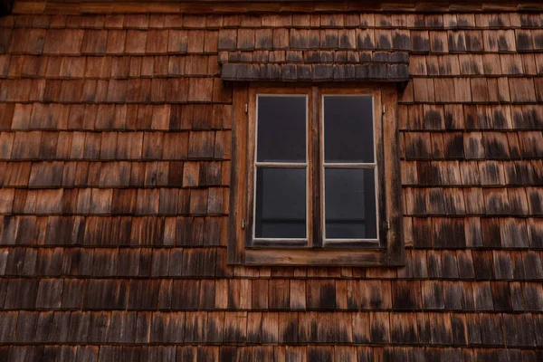 old wooden window with wooden shutters