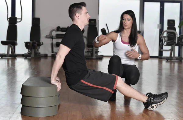 Female personal trainer working — Stock Photo, Image