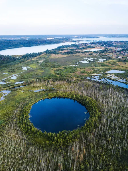 Bottomless circle Lake in forest of Solnechnogorsk District, Moscow region. Russia. Aerial view