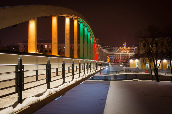 Kaarsild Bridge in Tartu, Estonia, in the colours of Lithuanian flag to celebrate the 100 years of independence of Lithuania