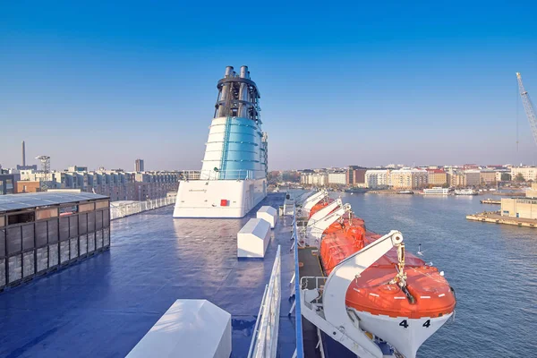 View of the upper deck of the cruise liner and the bay in the po