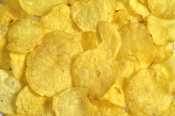 Ropogós burgonya chips, snack a textúra, élelmiszer-háttér, közelkép — Stock Fotó