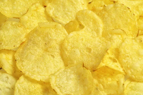 Knapperige aardappel chips snack textuur, voedsel, achtergrond, close-up — Stockfoto