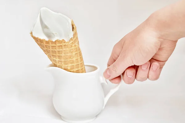 Hand Puts Ice Cream Waffle Cone White Jug Close White — Stock Photo, Image