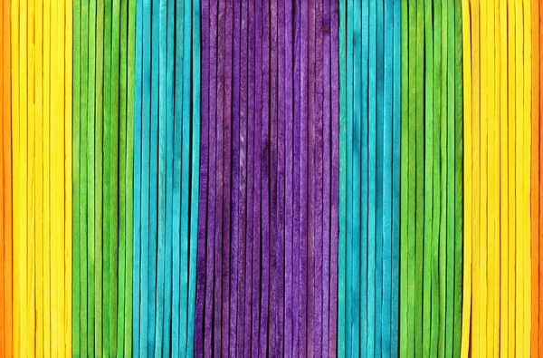 Parlak gökkuşağı renk desenli renkli ahşap duvar dokusu.