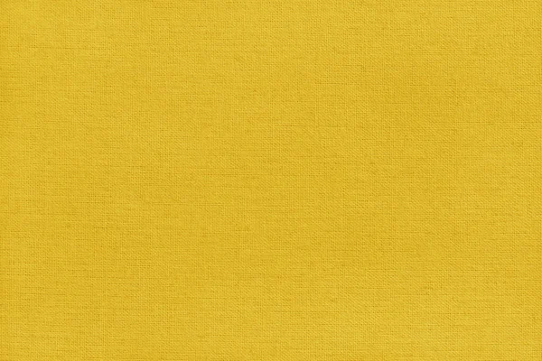 Sarı kumaş dokusu arka plan, doğal tekstil yüzeyinin pürüzsüz deseni.