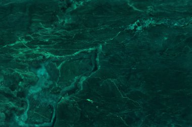 Koyu yeşil mermer desenli arka plan, yüksek çözünürlüklü, doğal taşların üst görüntüsü lüks ve pürüzsüz parıltı desenli..
