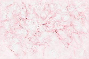 Yüksek çözünürlüklü pembe mermer desenli arka plan, pürüzsüz parıltı desenli ve konforlu doğal taşların karşı görüntüsü.