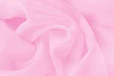 Arka plan ve tasarım için yumuşak pembe kumaş dokusu, güzel buruşmuş ipek ya da keten deseni..