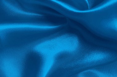 Arka plan ve tasarım için mavi kumaş dokusu, güzel buruşuk ipek ya da keten deseni.