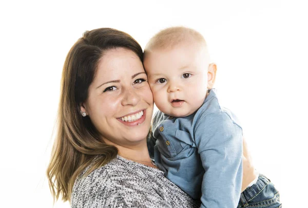 Loving mother holding her baby son on white background — Stock Photo, Image