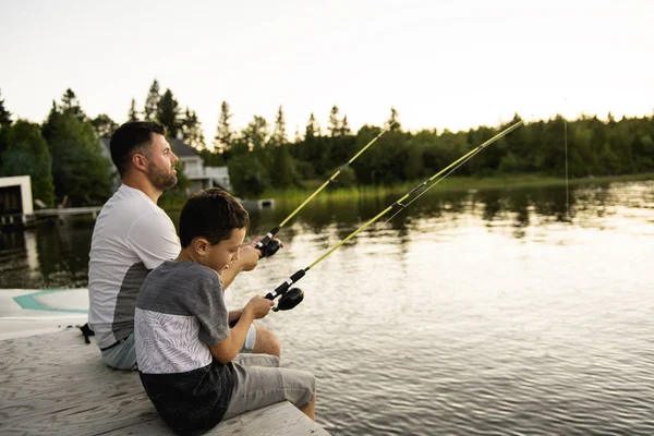Cool Dad and son fishing on lake — Stock Photo, Image