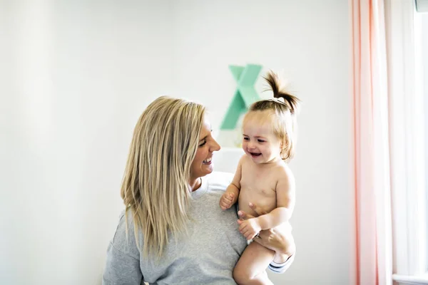 Mother and baby having good time on baby room — Stock Photo, Image