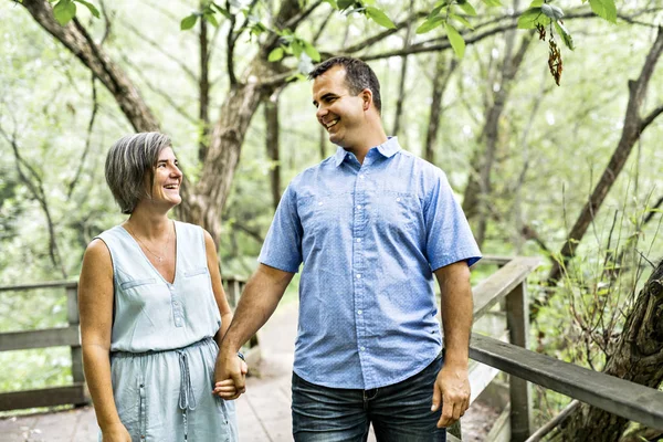 Couple embracing each other having walk in the summer forest — Stock Photo, Image
