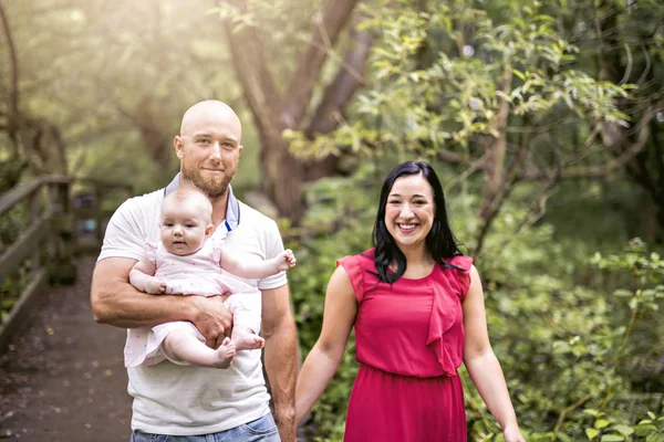 Father Mother and daughter baby in summer meadow park — Stock Photo, Image