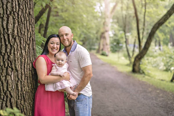 Father Mother and daughter baby in summer meadow park — Stock Photo, Image