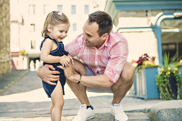 Young father on street with tiny daughter girl — Stock Photo, Image