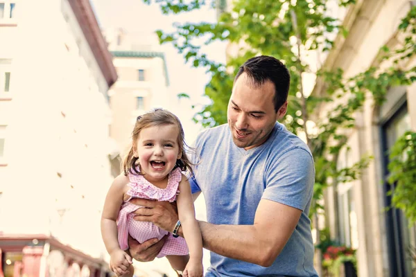 Young father on street with tiny daughter girl — Stock Photo, Image