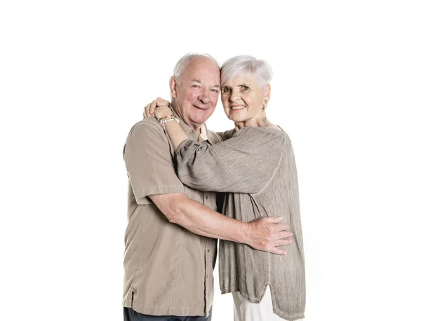 Senior couple posing on studio white background — Stock Photo, Image