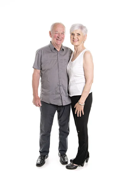 Senior couple posing on studio white background — Stock Photo, Image