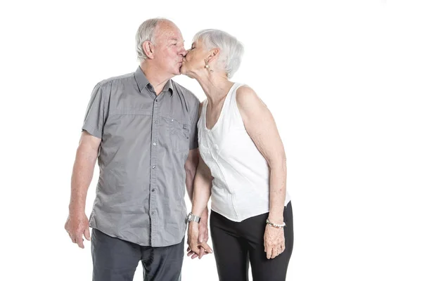 Senior couple posing on studio white background — Stock Photo, Image