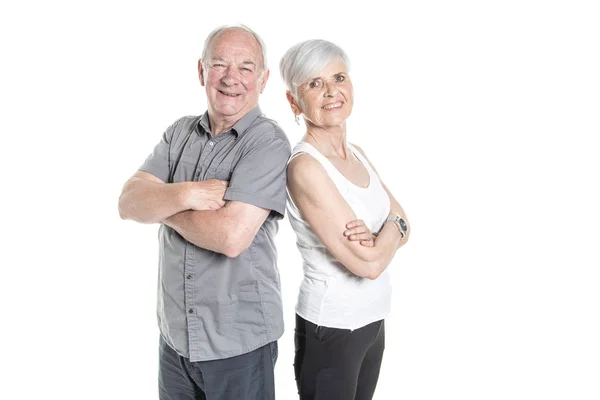 Senior paar posiert auf Studio weißen Hintergrund Arm Kreuz — Stockfoto
