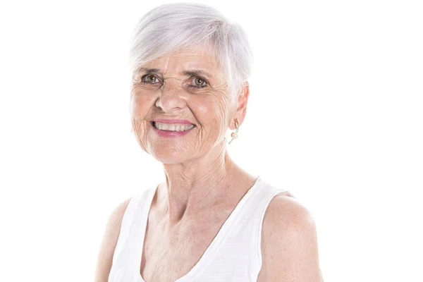 Elderly woman on studio white background — Stock Photo, Image