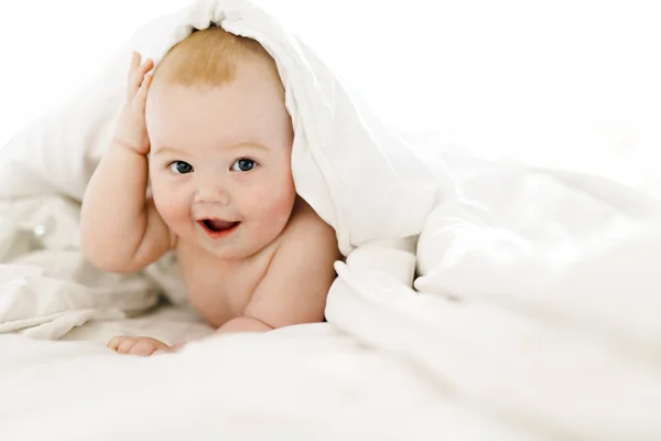 Beautiful baby girl in the bed at home — Φωτογραφία Αρχείου