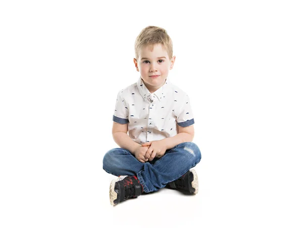 Un chico posando sobre fondo blanco del estudio —  Fotos de Stock