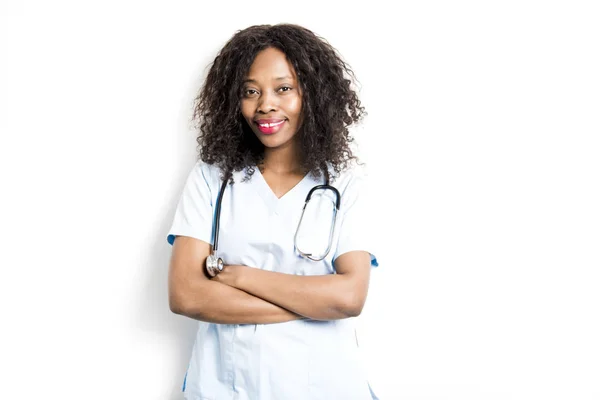 Happy african medical intern doctor on studio white — Stock Photo, Image