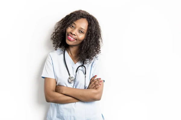 Happy african medical intern doctor on studio white — Stock Photo, Image