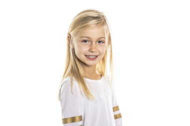 A Cute girl 5 year old posing in studio clipart