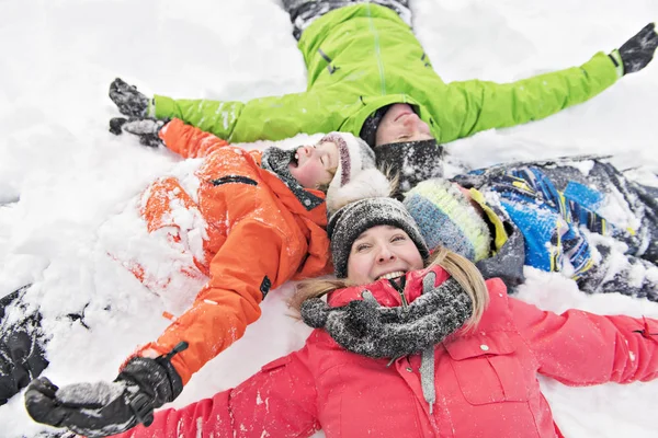 Family and child spending time outdoor in winter — Stock Photo, Image