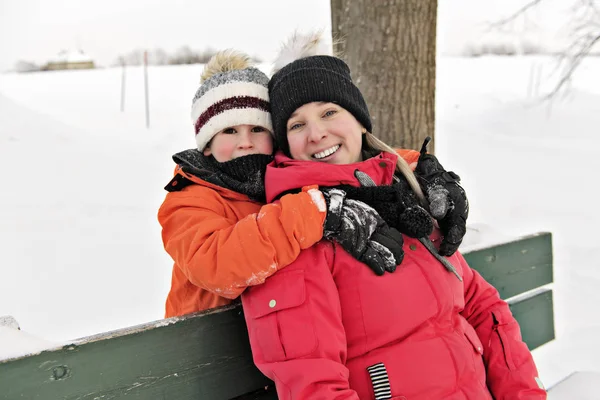 Nice Mother and Son In Snowy Landscape — Stock Photo, Image