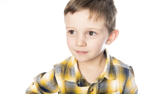 A boy shot in the studio on a white background. — Stock Photo, Image