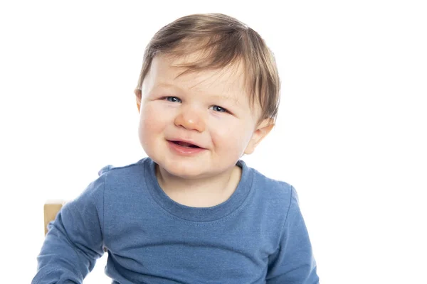 Um menino bonito isolado no fundo branco . — Fotografia de Stock