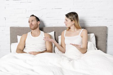 Bad Couple conflict on bed. Couple mistake clipart