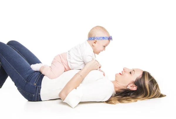 Foto de madre feliz con adorable bebé aislado en blanco —  Fotos de Stock