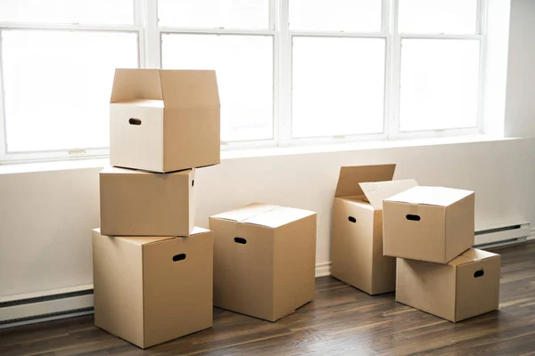 Lot of box at home with window on back — Stock Photo, Image