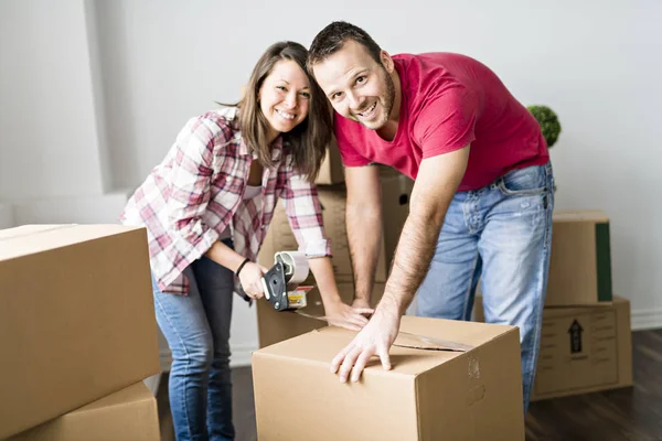 A loving Couple moving from house at day time