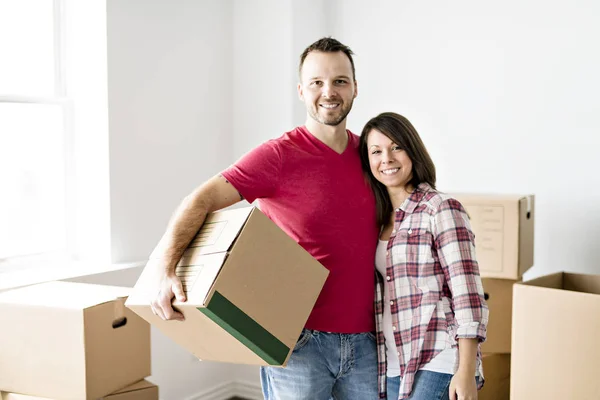 A loving Couple moving from house at day time Royalty Free Stock Images