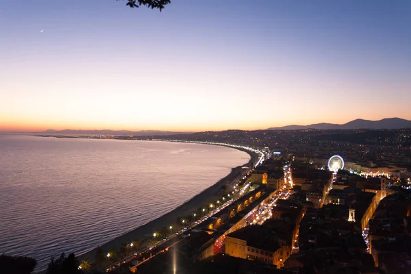 Nice beach night landscape, France.  Nice beach and famous Walkway of the English, Promenade des Anglais. Famous French touristic town
