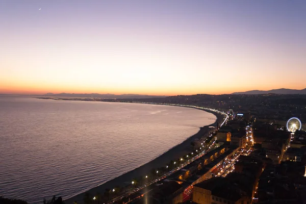 Nice beach night landscape, France.  Nice beach and famous Walkway of the English, Promenade des Anglais. Famous French touristic town