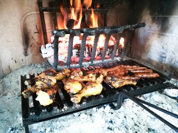 Grilled meat on fireplace — Stock Photo, Image