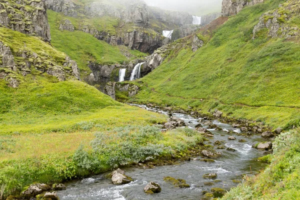 Klifbrekkufossar falls in summer season view, Islanda . Foto Stock